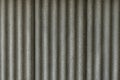 Texture of fiber cement roof sheet. Close up of corrugated wave asbestos tile. Classic style
