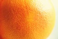 Texture of fresh bright orange peel, closeup, copy space. Macro of orange fruit. Citrus fruit background Royalty Free Stock Photo