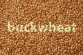 Texture of fresh clean useful buckwheat groats grain close-up. Healthy dietary food rich in microelements cellulose