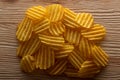 Texture fried golden brown potato chips, close-up