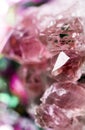 Texture of gemstone pink Fluorite closeup as a part of cluster geode filled with rock Quartz crystals. Royalty Free Stock Photo