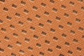 Texture of genuine matte perforated genuine leather close-up, fashion bright orange color, modern background Royalty Free Stock Photo