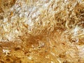 Texture of the gold leaf, Gold background, Picture from Buddha image Back Royalty Free Stock Photo