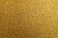 Texture of golden colored foamiran sheet with sparkles Royalty Free Stock Photo
