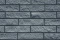 Texture of gray brick wall. The wall is tiled decorative. Grey stone background of house facade. Brick wall texture grunge backgro Royalty Free Stock Photo