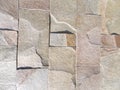 Texture of gray brown stone wall of fence