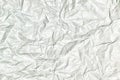 Texture of gray crumpled paper, abstract background for layouts.