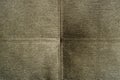 Texture of gray fabric. Darkly gray background.