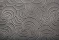 Texture of gray genuine leather with embossed floral trend pattern close-up, color, for wallpaper or banner design Royalty Free Stock Photo