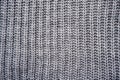 The texture of a gray knitted woolen jacket, sweater Royalty Free Stock Photo