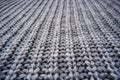 The texture of a gray knitted woolen jacket, sweater Royalty Free Stock Photo