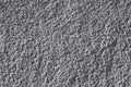 Texture of gray wall with rough stucco