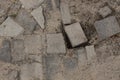 Texture of gray stone bricks of paving slabs on an unfinished road Royalty Free Stock Photo