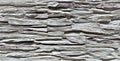 Texture of gray stone masonry.