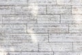 The texture of a gray stone wall made of rectangular marble blocks. Royalty Free Stock Photo