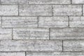 The texture of a gray stone wall made of rectangular marble blocks Royalty Free Stock Photo