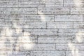 The texture of a gray stone wall made of rectangular marble blocks. Royalty Free Stock Photo