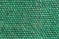 Texture of green fabric close-up, fabric fibers macro