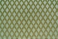 Texture of green fabric with rombic pattern