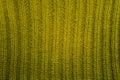 Texture of green knitted wool sweater