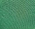 Texture of a green woven synthetic waterproof fabric Royalty Free Stock Photo
