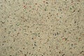 Texture of grey-beige porcelain granite tile with multi-colored inserts Royalty Free Stock Photo