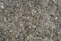 Texture of grey cement mixed with gravel