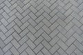 Texture of grey concrete pavement with herringbone layout Royalty Free Stock Photo