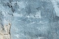 The texture of gypsum or alibaster cracked plaster on the wall is a thick layer. Gradient gray putty wall background Royalty Free Stock Photo