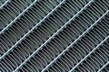 Texture of a honeycomb of an automotive aluminum car cooling radiator, close-up