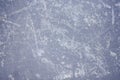 The texture of the ice skating rink, skated, closeup. Open ice rink winter background