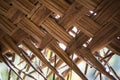 Texture interweaving of palm and banana leaves on tropical beach umbrellas and mats.