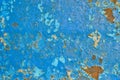 The texture of the iron metal painted blue paint old battered scratched cracked ancient rusty metal sheet wall with corrosion. Royalty Free Stock Photo