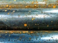 Texture of iron pipes full of rust, rundown and dirty. Pile of hollow iron rods for metal background Royalty Free Stock Photo