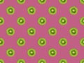 texture. Kiwi repeating seamless pattern on purple background. Kiwi is cut.