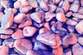 Texture: large sanded gravel. Small white chalk stones red and blue hues. Artistic reliefs from natural objects. Royalty Free Stock Photo