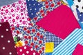 The texture of large scraps of colored fabrics as a background or backdrop, home patchwork crafts or creativity