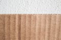 Texture of layered brown cardboard side. Folded cardboard box ag
