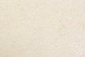 Texture of light cream paper, background for design with copy space text or image. Recyclable material, has small Royalty Free Stock Photo