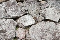 Texture of limestone stacked to wall. Pattern of wall rock on th Royalty Free Stock Photo