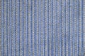 The texture of lined blue coarse cloth, the background of the carpet with the lines of the seams Royalty Free Stock Photo