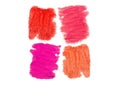 The texture of the lipstick of different colors isolated on whit