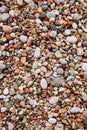 The texture of the little pebbles on the beach. Shoot from above space for message