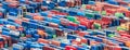 Aerial view over shipping containers stacked on a commercial port