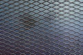 Texture of metal expanded lath. with iron plate background