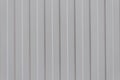 The texture of metal profiled, sheet material for fencing and roofing