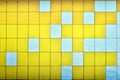 The texture of the metal wall, framed in the form of colored squares of two colors. Modern wall design for the exterior of reside Royalty Free Stock Photo