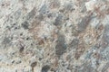 Texture of motley natural stone, close-up