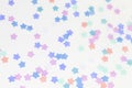 Texture with multicolored stars on a white background Royalty Free Stock Photo