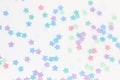 Texture with multicolored stars on a white background Royalty Free Stock Photo